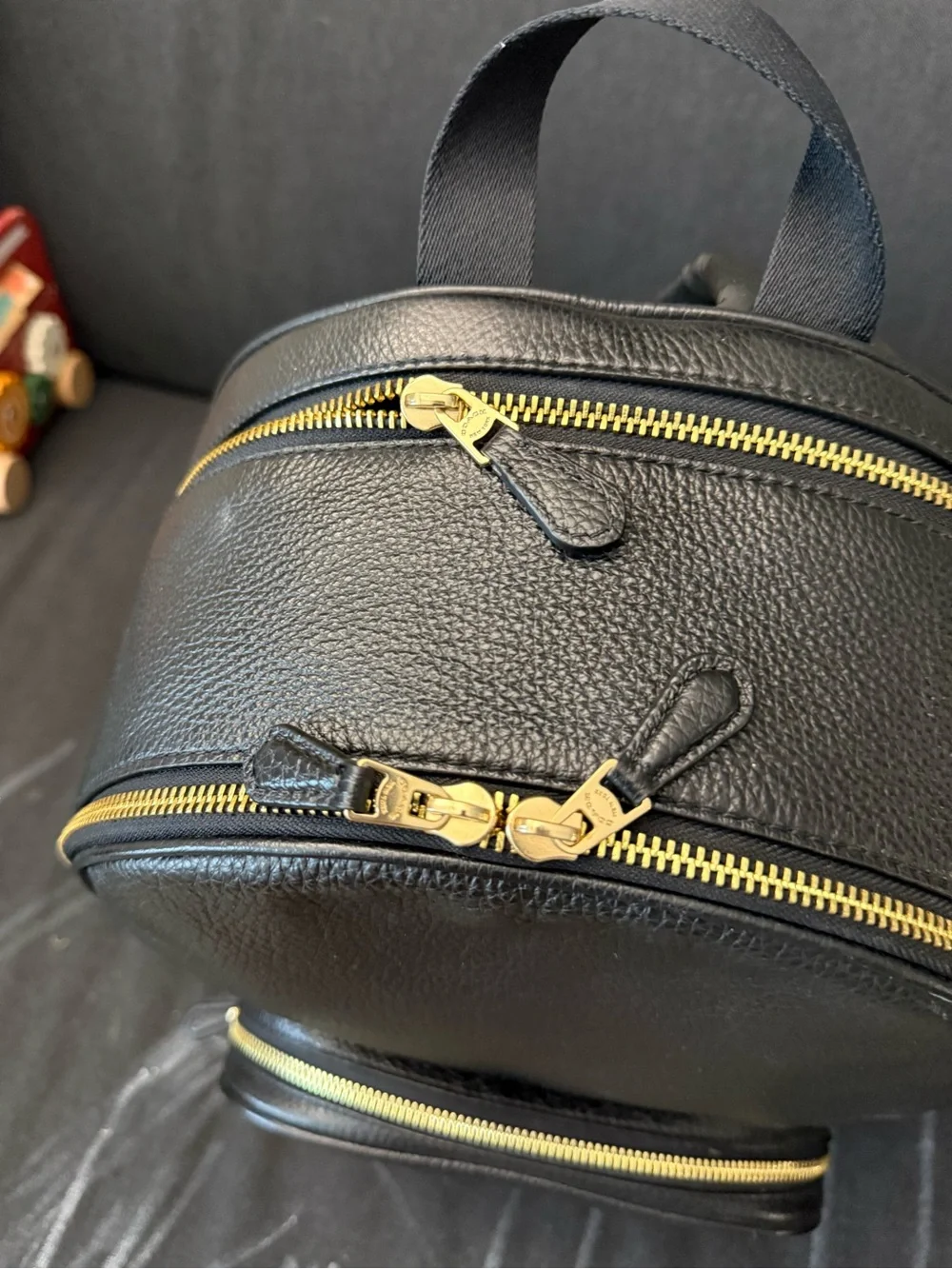 Coach Black Pebbled Leather Zip-Front Backpack with Gold Hardware